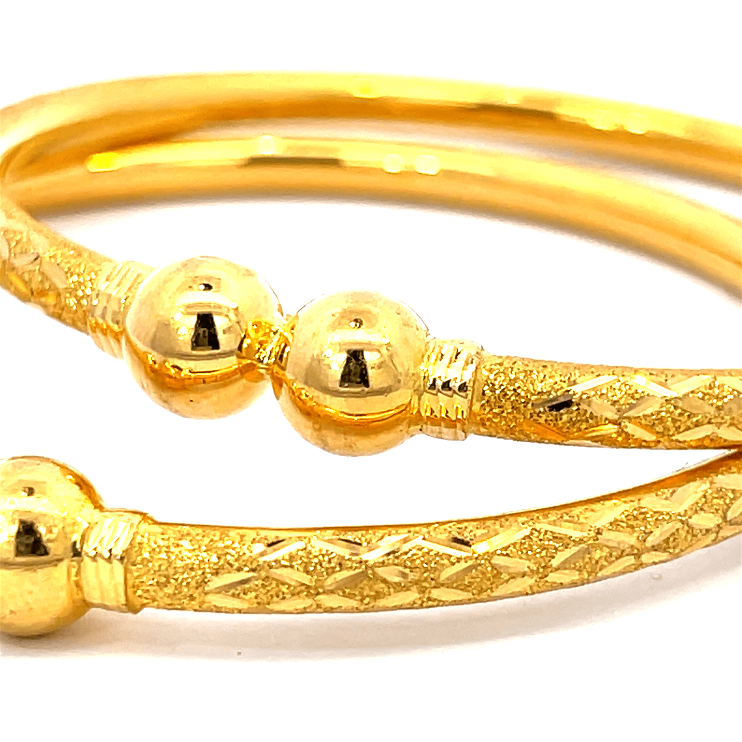 22K Yellow Gold Pipe Bangles in size 2.3 and gold weight of 26.3g