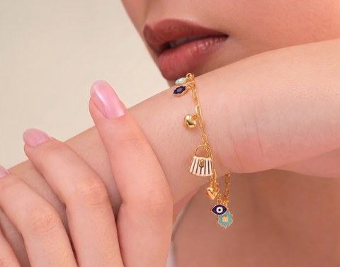 22K Yellow Gold Charm Bracelet measuring 6mm thickness x 7.5 inch length