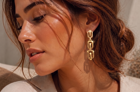 22k Yellow Gold Dangling Fancy Earrings with gold weight of 3.7g