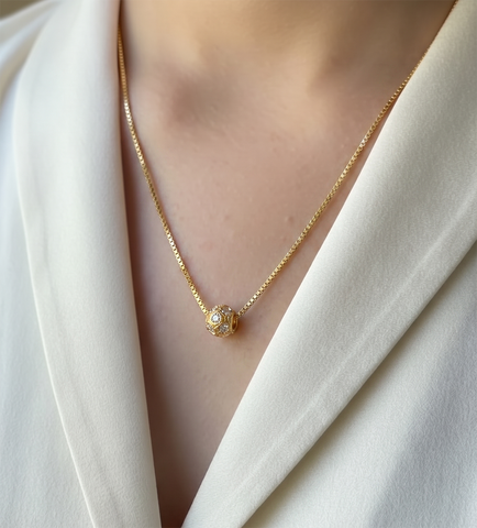22K Yellow Cubic Zirconia Ball Pendant with gold weight of 0.88g