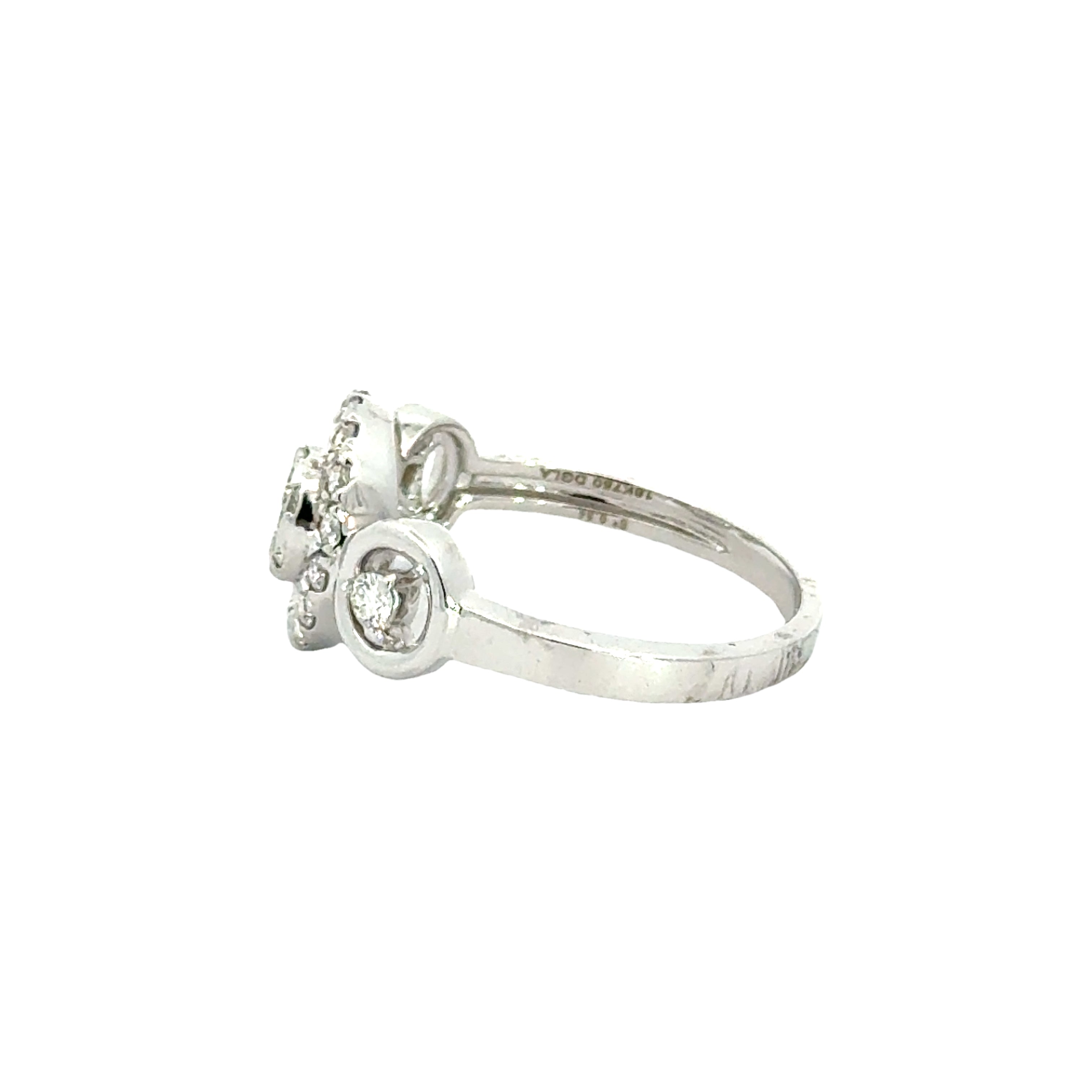 18k White Gold and Diamond Fancy Ring in size 5 and total gold weight of 2.9g