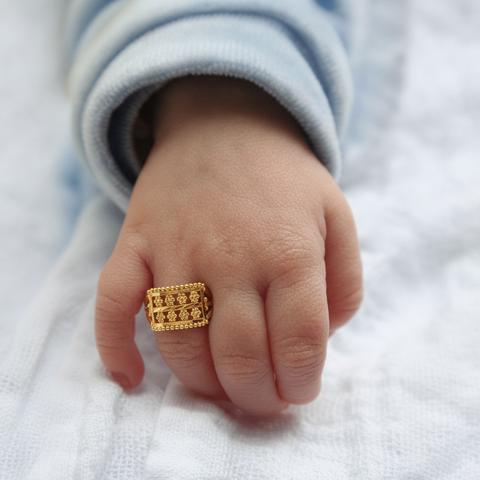 22k Yellow Gold Baby Ring in size and total gold weight of 1.1g