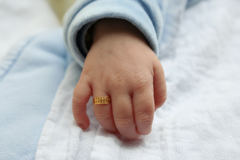 22k Yellow Gold Baby Ring in size and total gold weight of 1.1g