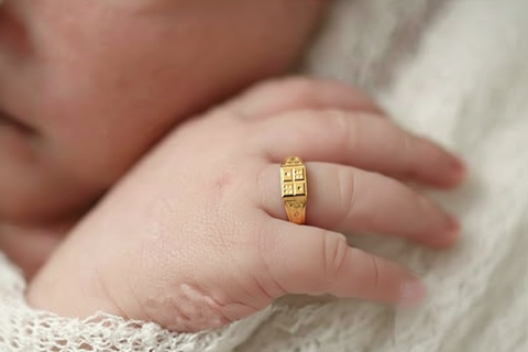 22k Yellow Gold Baby Ring in size 1.5 and total gold weight of 1.46g