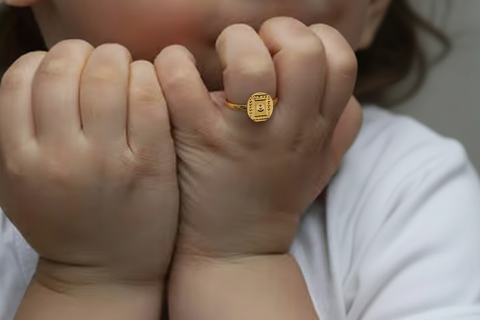 22k Yellow Gold Baby Ring in size 2 and total gold weight of 1.04g