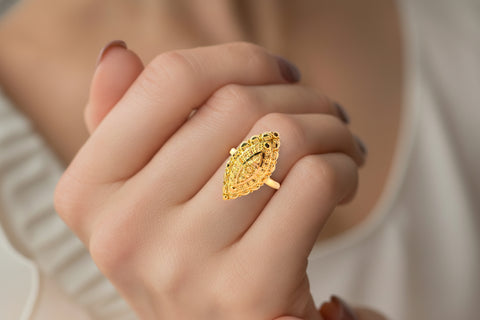 22k Yellow Gold Fancy Marquise Ring in size 7.4 and total gold weight of 2.73g
