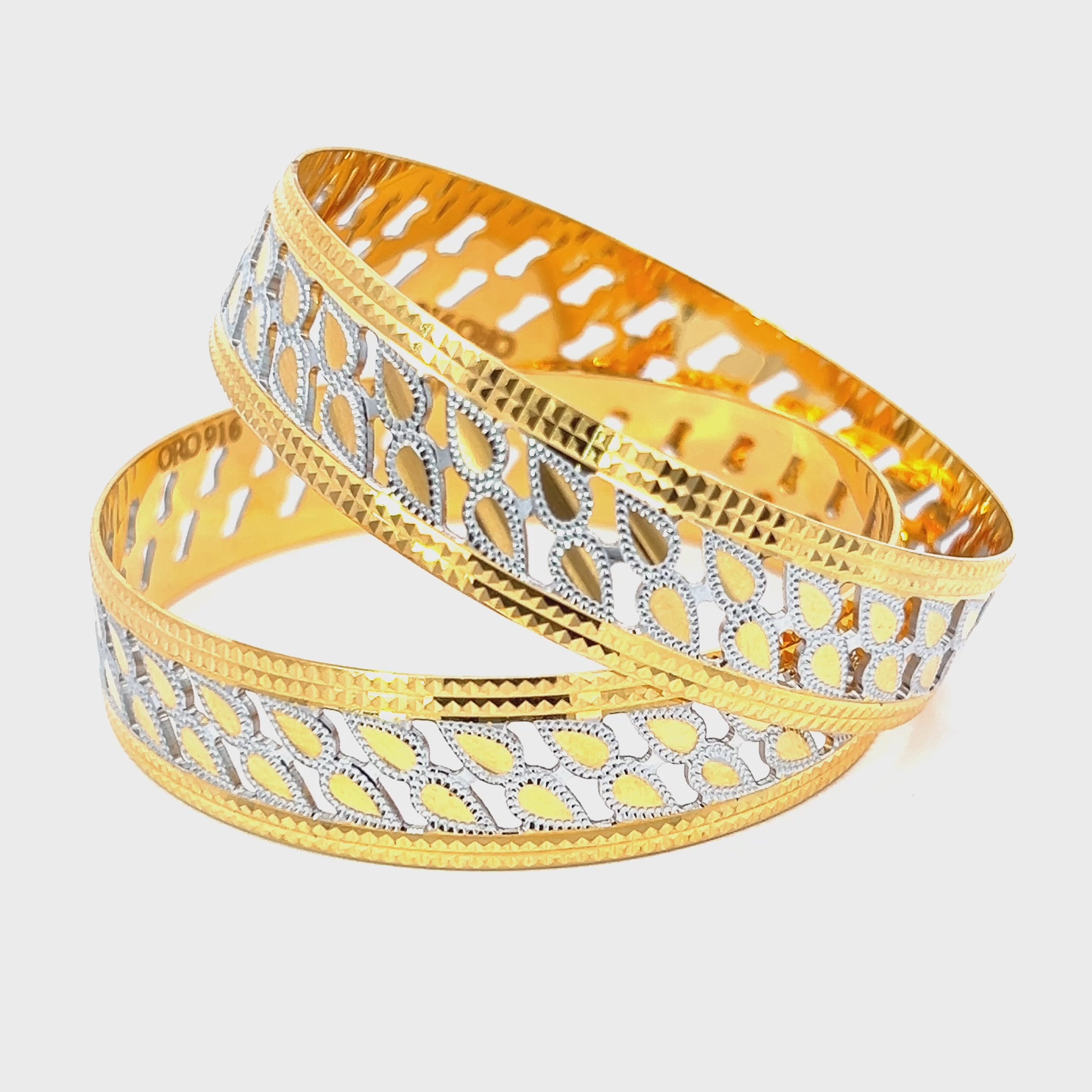 22K Two Tone Gold Fancy Bangles in size 2.5 and gold weight of 59.5g