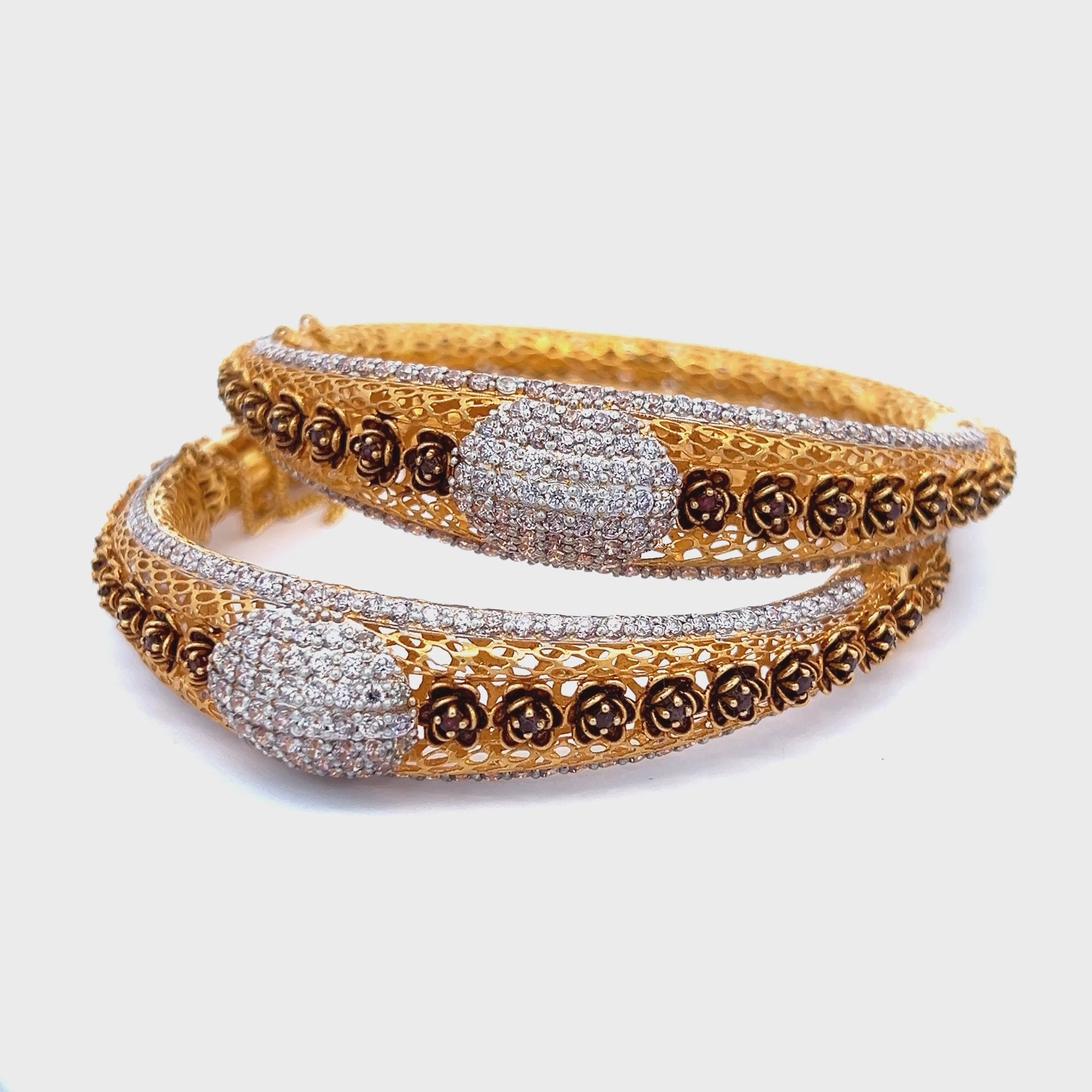 22K Yellow Gold Designer Hinged Bangles in size 2.6 and gold weight of 61.8g