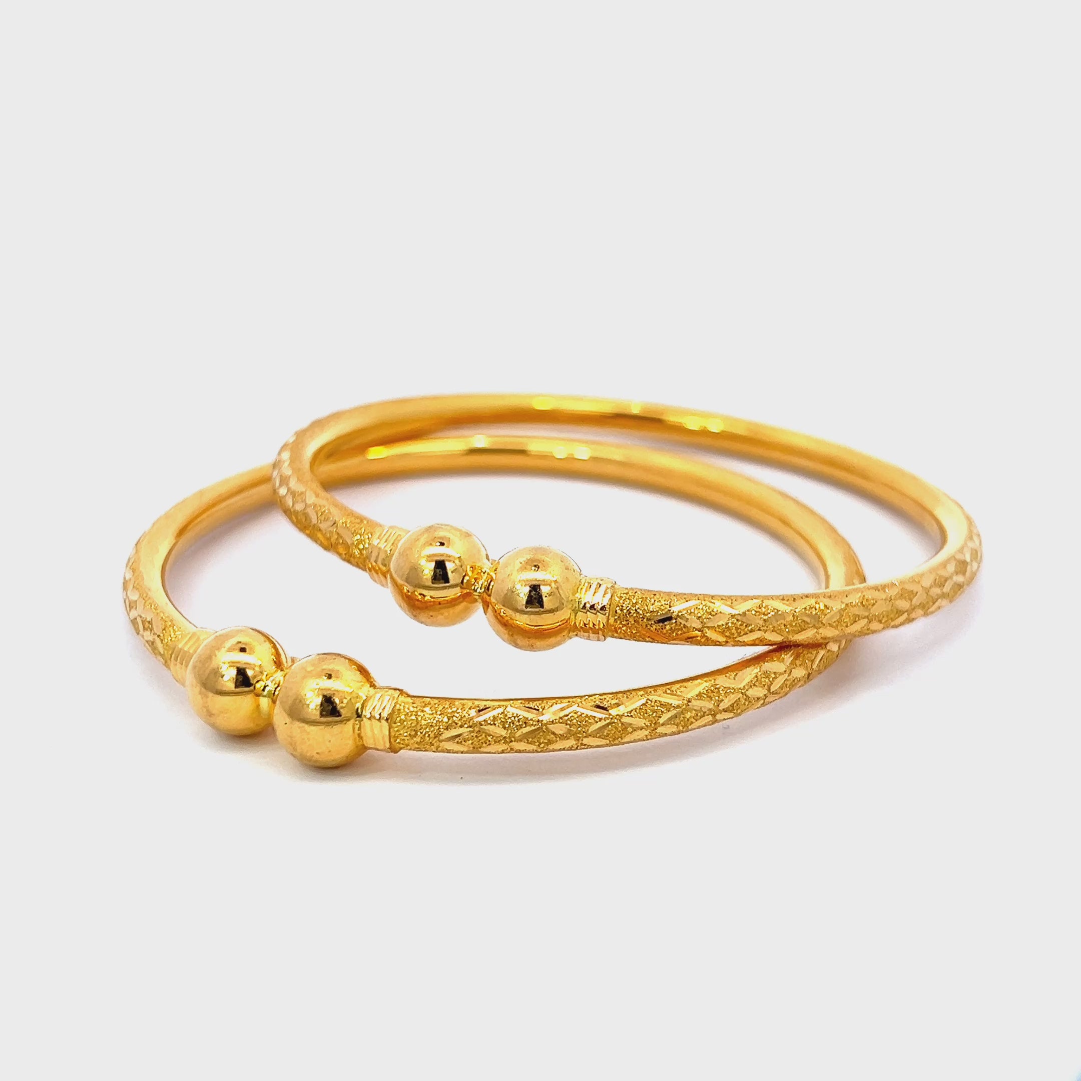 22K Yellow Gold Pipe Bangles in size 2.3 and gold weight of 26.3g